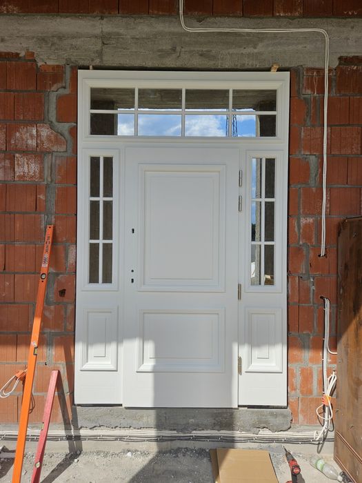 Drzwi zewnętrzne drewniane dębowe z montażem producent