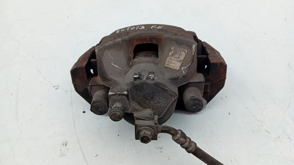 Pinça travão / maxila de travão frente esquerda OPEL Astra K
