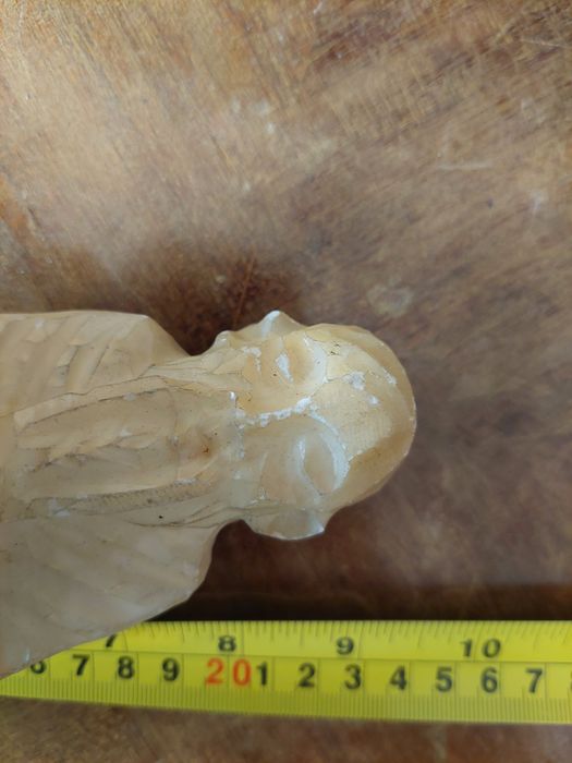 Escultura antiga em pedra