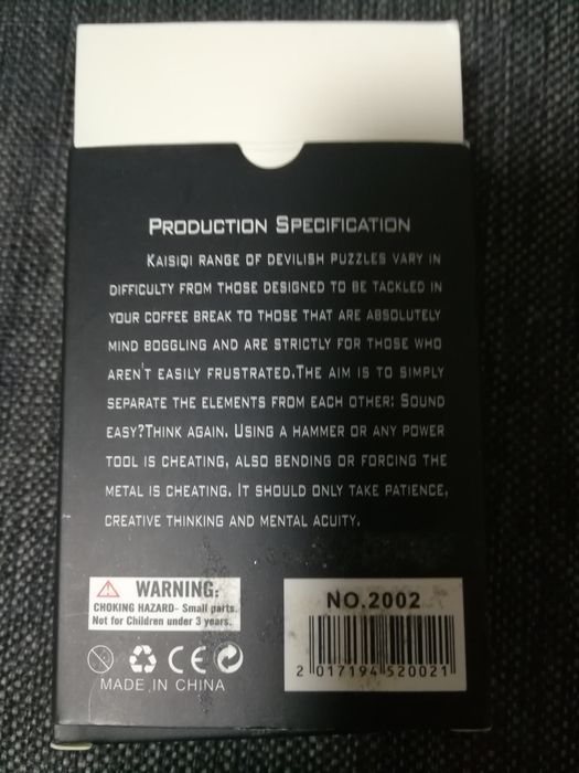 Головоломка металлическая.