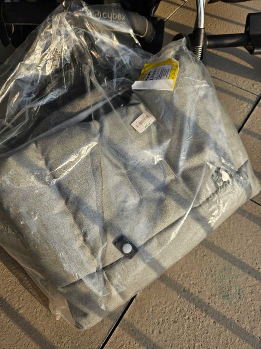 Cybex Koi – carrinho, cadeira auto + saco novo (chassis oferta)
