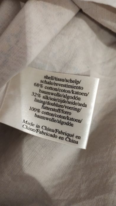 Bawełniano-jedwabna sukienka we wzór paisley marki Laura Ashley.