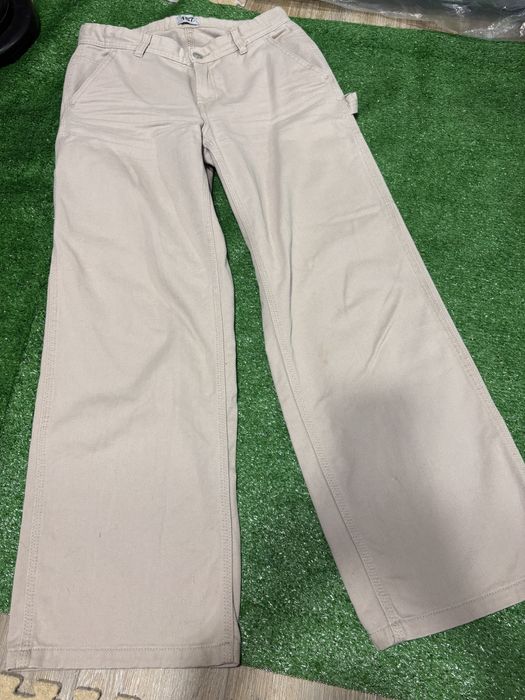 Облягаючі втягуючі кльош штани