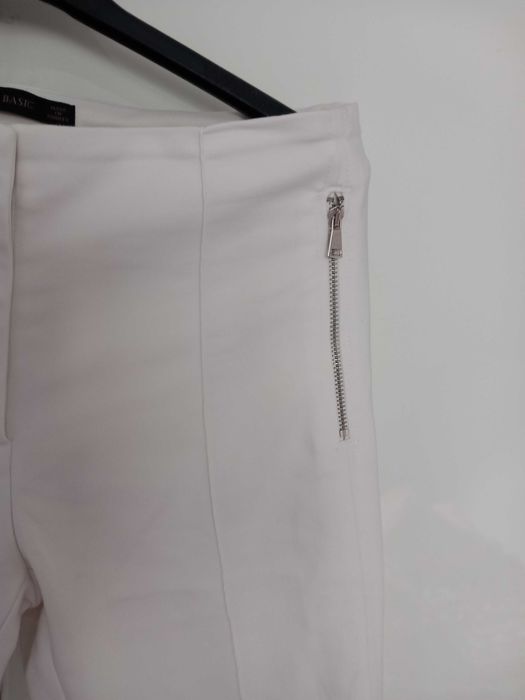 Śmietankowe eleganckie spodnie Zara XS 34