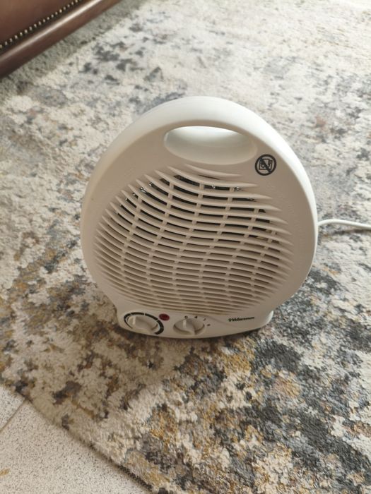 Aquecedor elétrico com exaustão e ventilação