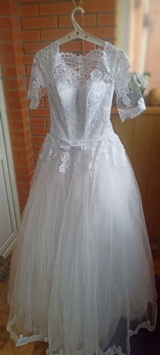 Ніжна весільна сукня