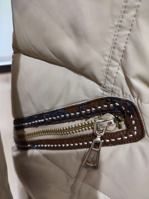 Зимняя женская пуховик