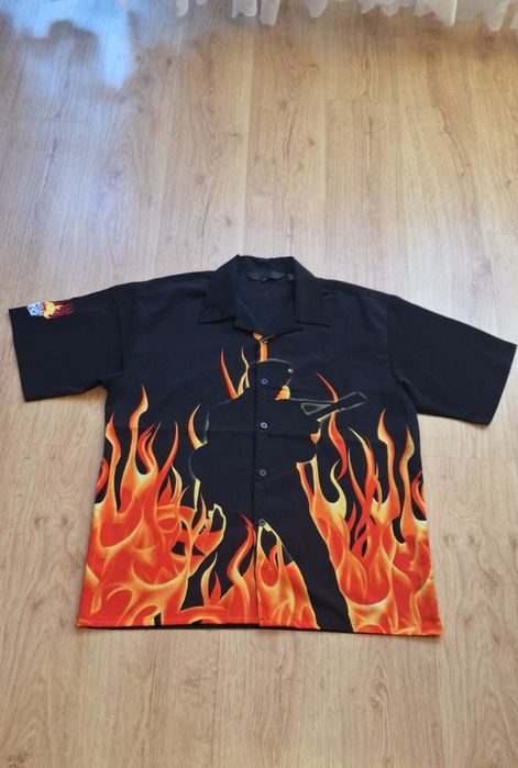 Świetna koszula motyw ogień, płomień, gitara. Rozmiar XL/XXL

#fire #burn #gitara #guitar #hawaii #hippie #ogien #plomien #rockguitar #rock