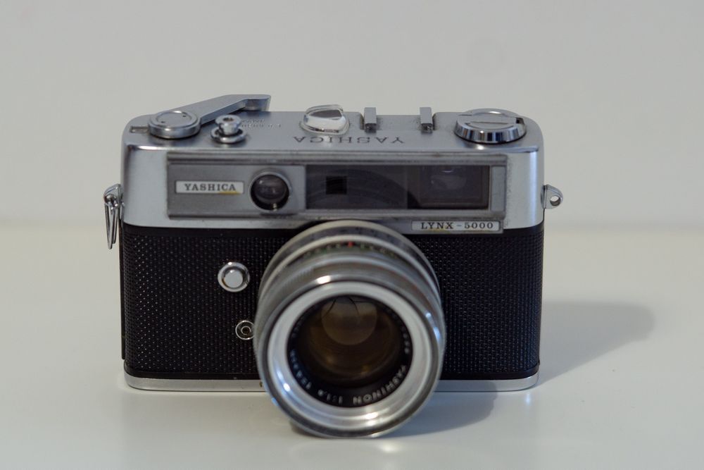 Câmera analógica Yashica Lynx-5000 (Rangefinder) | Para Peças ou Arran