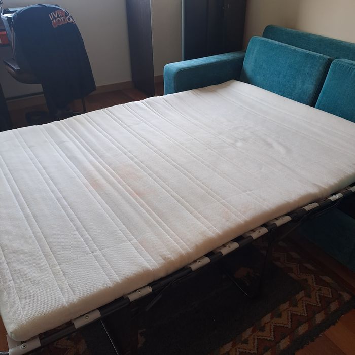 Sofá cama  de casal cor azul com pouca utilização  em muito bom estado
