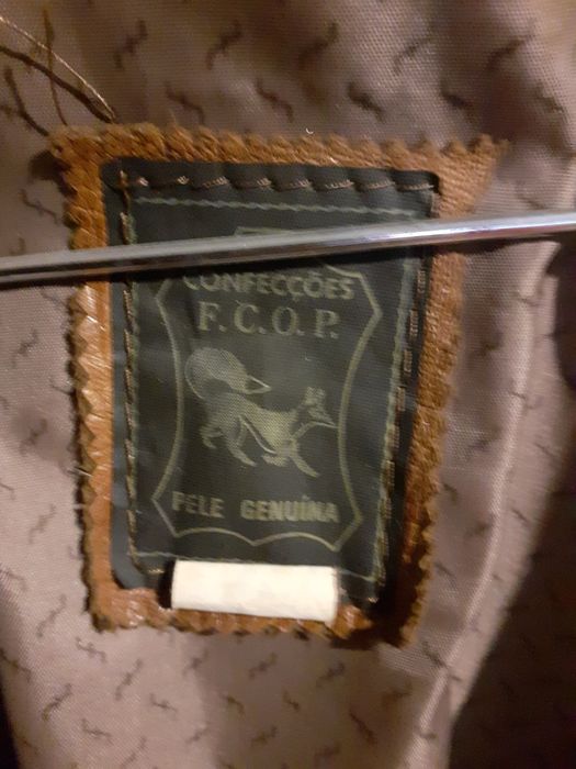 Casaco em pele como novo