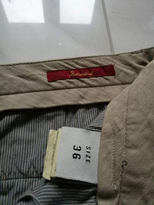 Spodnie Indywidual rozmiar 36W-32L, 97% bawełna. Slim fit.