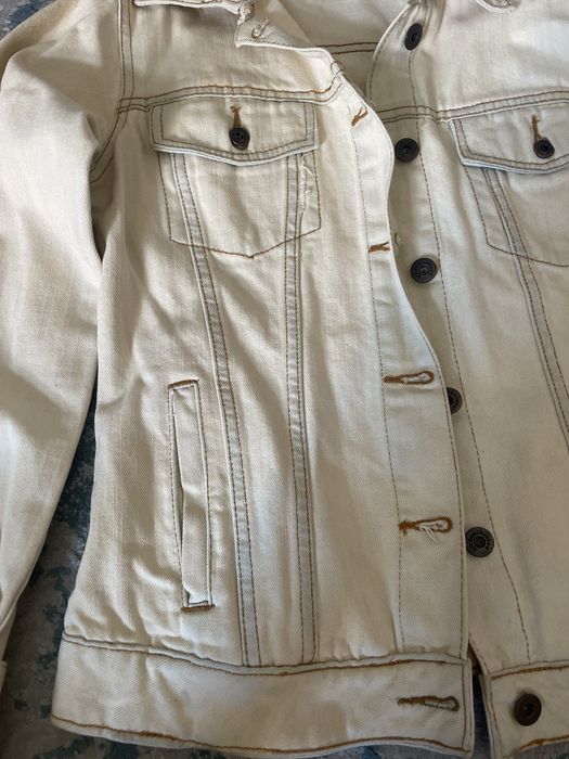Roupa: Casaco ganga beje