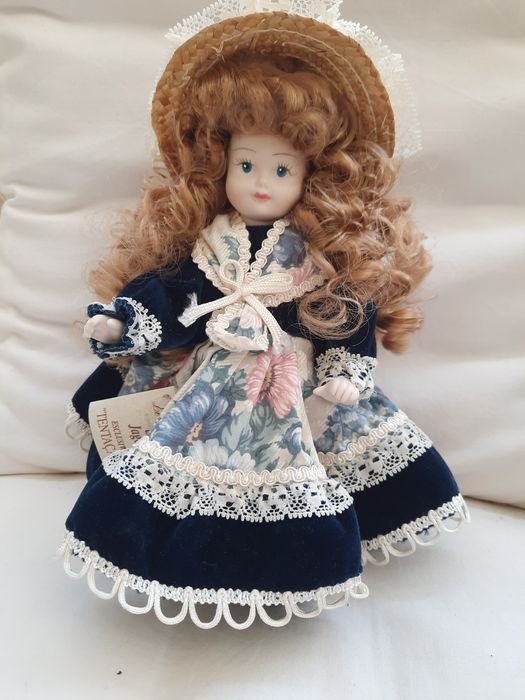 Boneca de porcelana/  Novo Preço