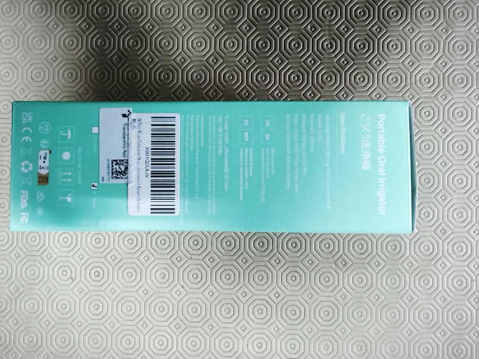 Irrigador oral portátil