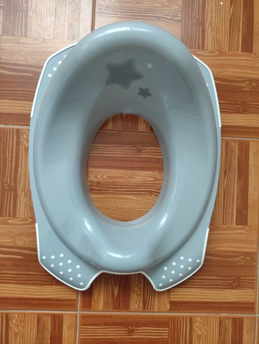 Redutor sanita de criança como novo