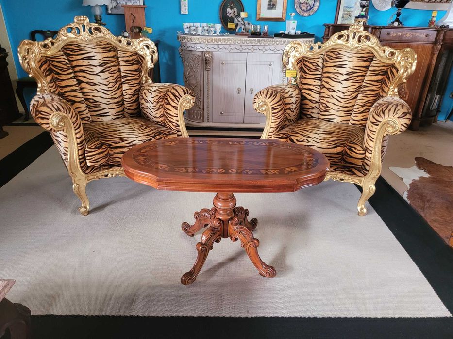 Very old carved wooden coffee table with