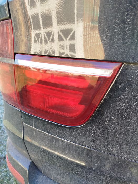 Задній лівий стоп кришки багажника бмв е70 оригінал рест