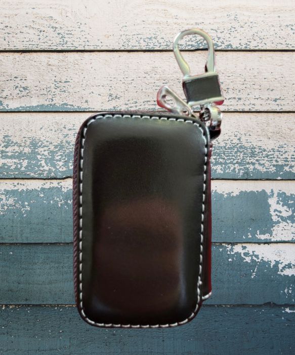 Jaguar- carteira, porta chaves. Novo. Excelente oportunidade