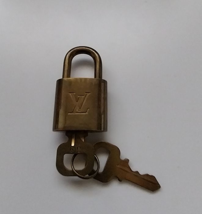 Aloquete antigo e original Louis Vuitton