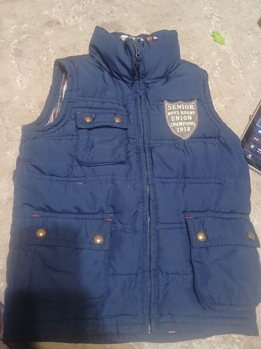 Продам жилетку синю