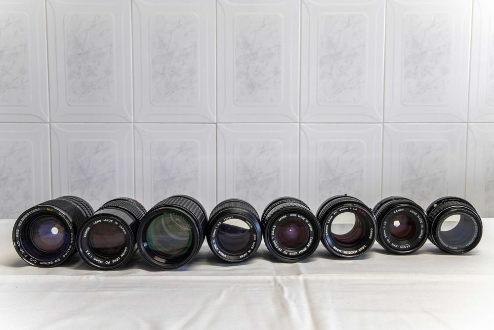 Lote de câmeras fotográficas+objetivas+acesórios