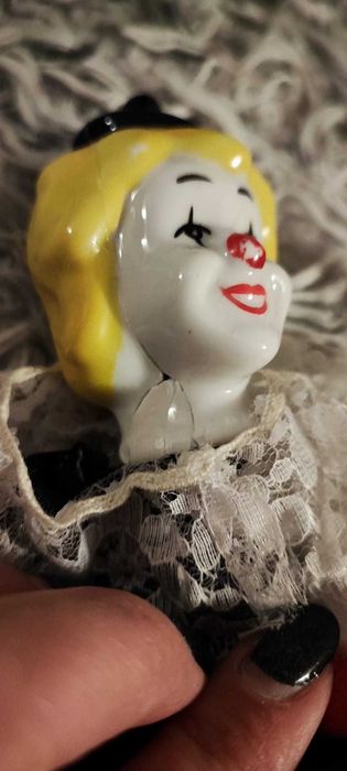 Palhaço boneca porcelana - danos