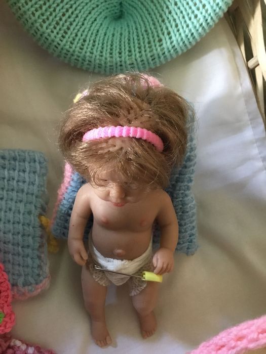 Mini bebé reborn com acessórios