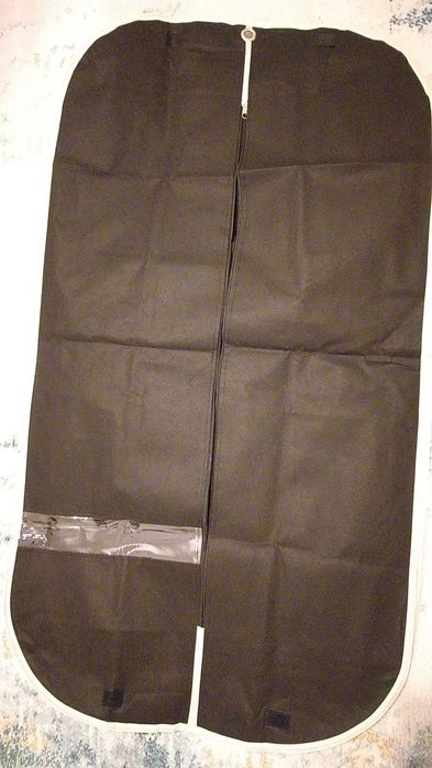 Capa-bolsa porta-fatos nova