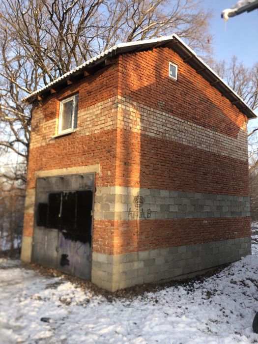 Гараж ( два поверхи)