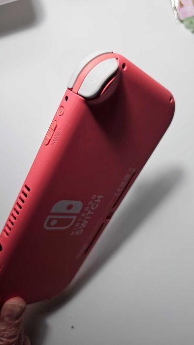 Nintendo switch lite coral
