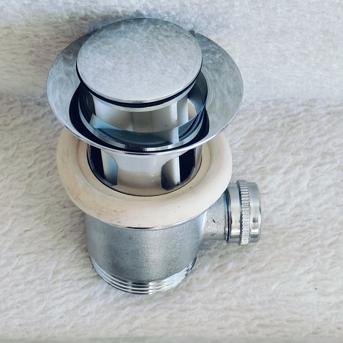 Korek do umywalki, metal