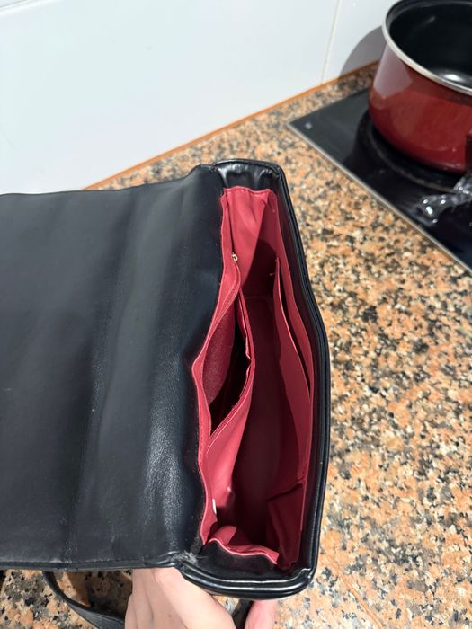 Luxury handbag with red interior