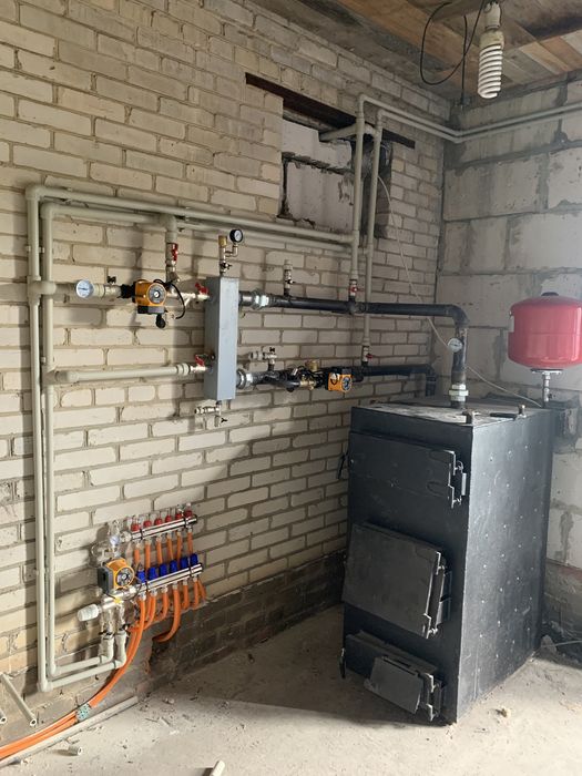 Установка газових дровʼяних пелетних електричних котлів димоходів