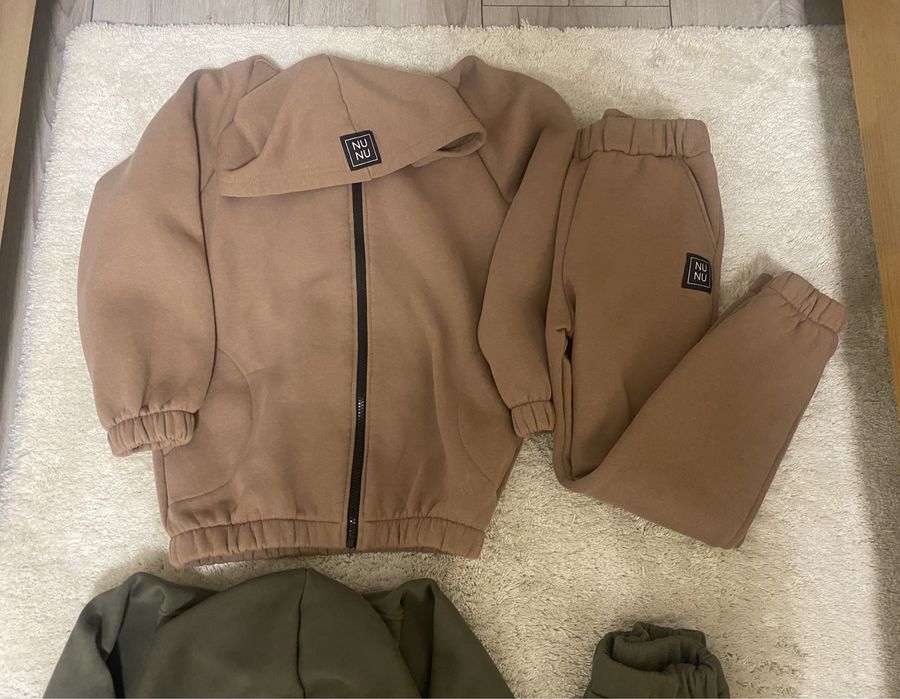 Dwa ocieplane dresy NuNu 128/134 stan idealny