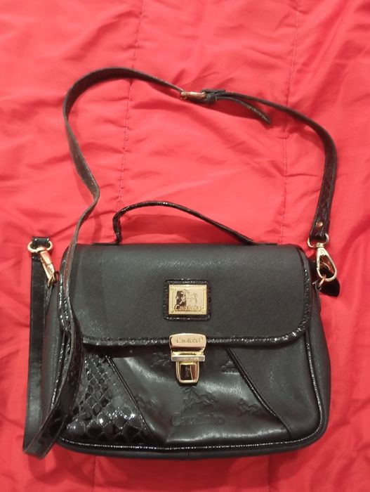 Vendo mala cavalinho preta