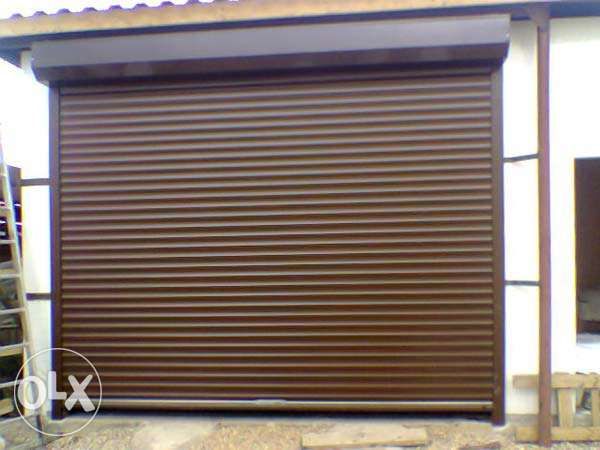 Гаражні ворота Kruzik, захисні роллети.