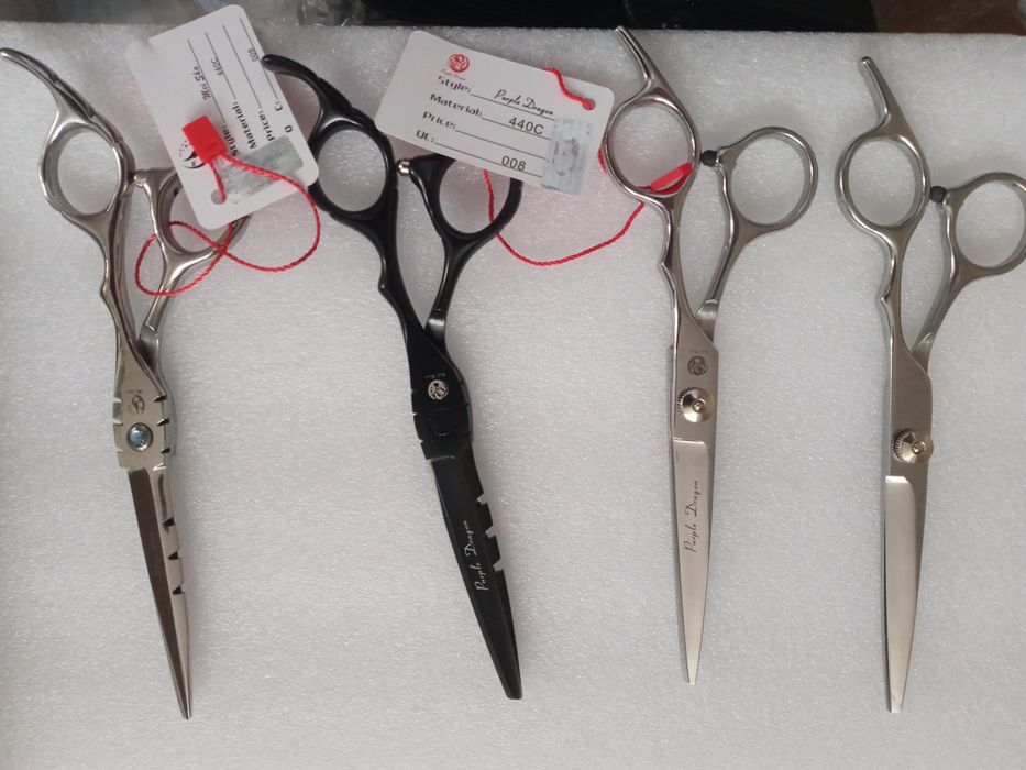 Новые парикмахерские ножницы для  волос.