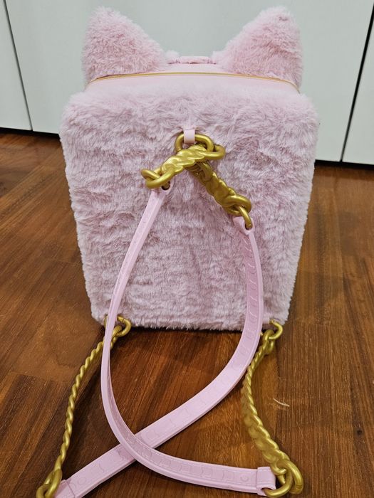 Mochila casinha com boneca