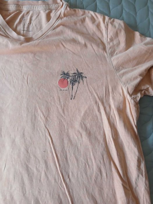 T shirt cor salmão com palmeira e pôr do sol