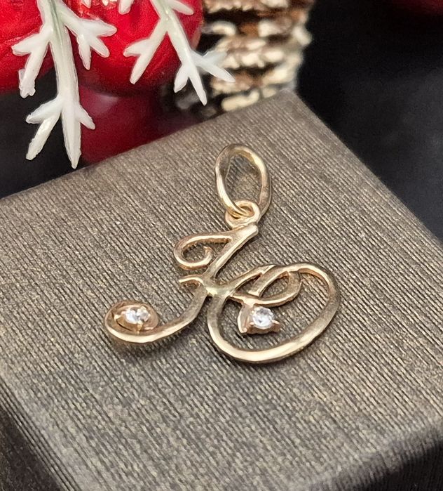 Złota zawieszka14K próby 585 literka "H" z cyrkoniami