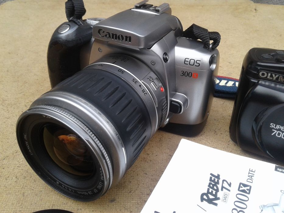 Фотоаппарат " Canon EOS 300X " , "Olympus Superzoom 700XB "