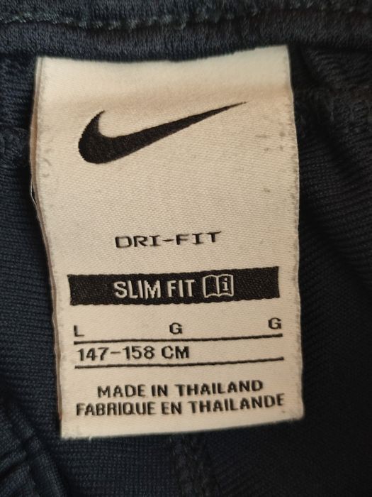 Nike FC Barcelona Strike. Spodnie dresowe dziecięce, rozmiar 147 cm - 158 cm