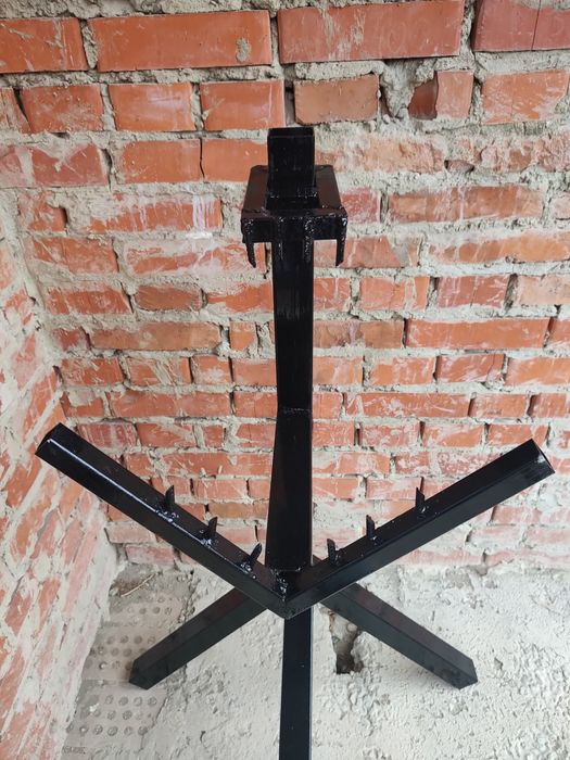 Тримач для порізки дров.