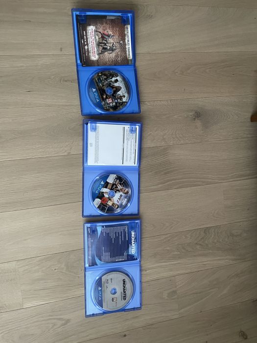 Диски PS4: Uncharted Натан дрейк колекція,Assasins creed syndicate,UFC 2