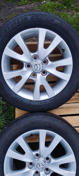 Felgi alu oryg Mazda 5x114,3 z oponami letnimi Bridgestone 205/55 R16, 4szt