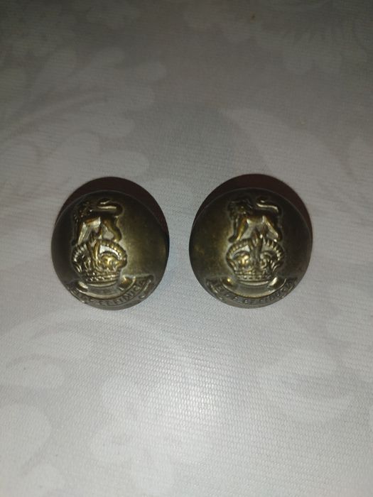 Латунная пуговица