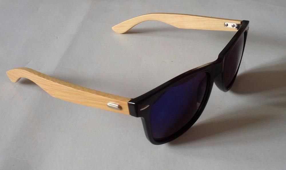 Elegantes óculos de sol, Unisexo, com caixa.