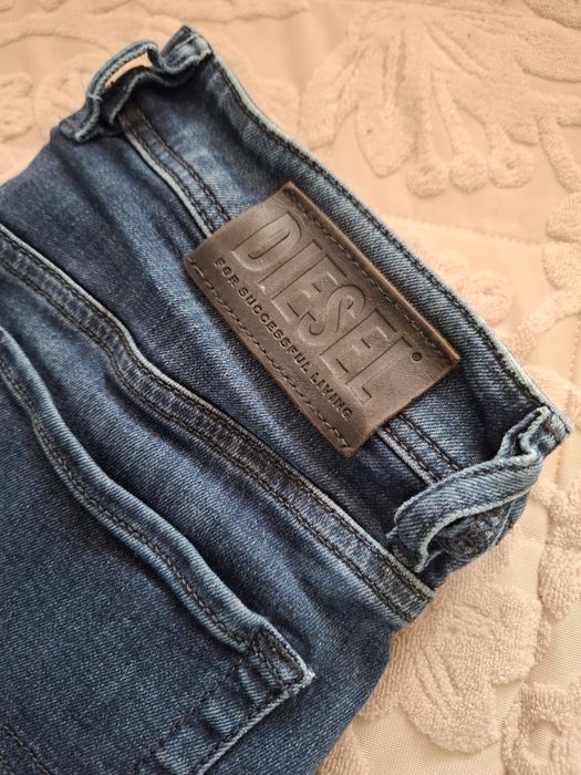 Jeansy DIESEL męskie ciemny jeans rozmiar W28