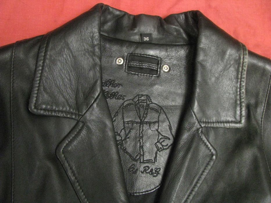 Дамское дизайнерское пальто - размер 54.